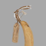 https://powell-cottonmuseum.org/wp-content/uploads/2021/05/Sperm-Whale-Tooth-Ornament-1.png